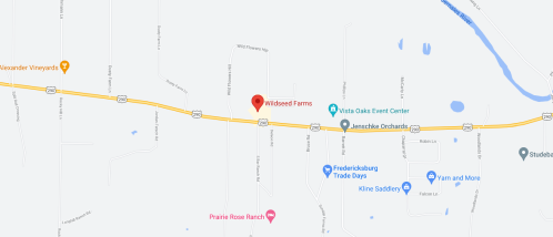 Map showing Wildseed Farms and nearby locations along Highway 290, including event centers and orchards.