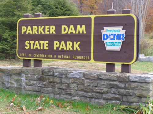 Sign for Parker Dam State Park, Pennsylvania, highlighting the Department of Conservation & Natural Resources.