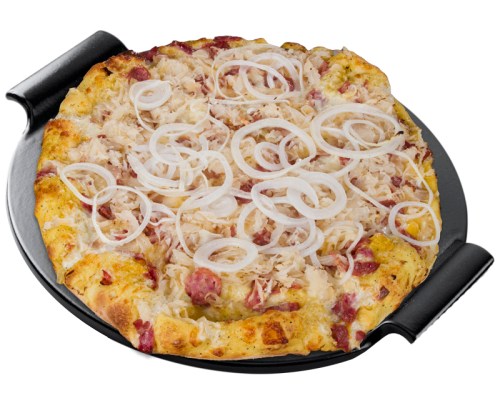 A freshly baked pizza topped with sauerkraut, sliced onions, and meats, served on a black pizza tray.