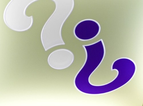 Two question marks in contrasting colors, one white and one purple, against a light green background.
