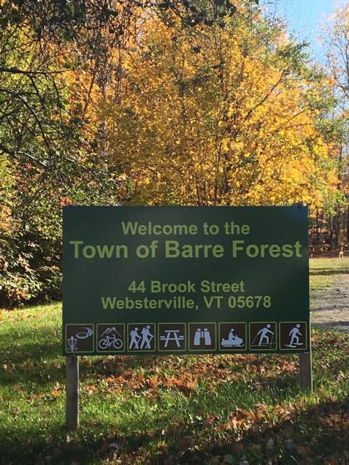 Welcome sign for Town of Barre Forest, located at 44 Brook Street, Websterville, VT, surrounded by autumn foliage.
