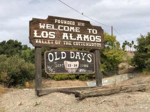 Wooden sign welcoming visitors to Los Alamos, established in 1876, promoting the "Old Days" event from September 22-24, 2017.