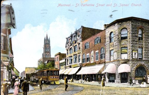 Vintage postcard of St. Catherine Street in Montreal, featuring shops, a streetcar, and St. James Church in the background.
