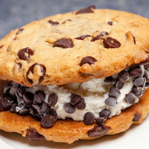 A delicious chocolate chip cookie sandwich filled with vanilla ice cream and chocolate chips.