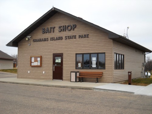 A bait shop at Graham's Island State Park, featuring a wooden exterior and a sign above the entrance.