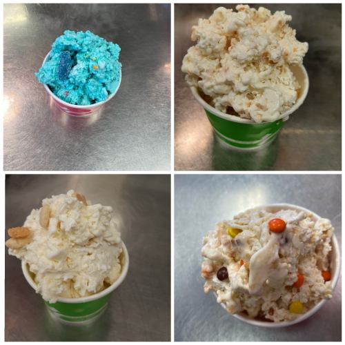Four cups of colorful ice cream and popcorn: one blue ice cream, three popcorn varieties with different toppings.