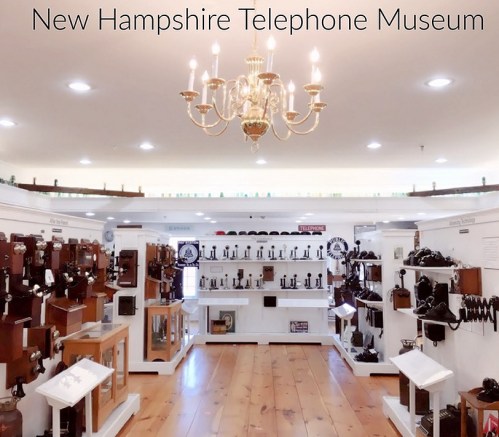 Interior of the New Hampshire Telephone Museum, showcasing vintage telephones and a chandelier.