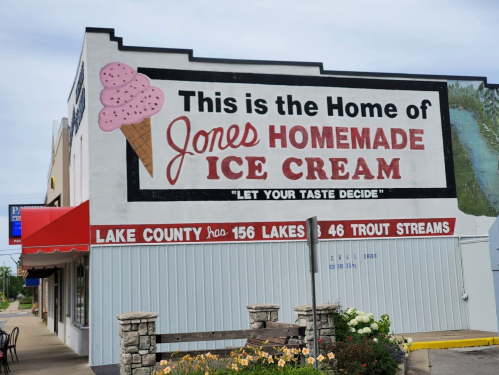 Mural on a building advertising "Jones Homemade Ice Cream" with a large ice cream cone graphic.