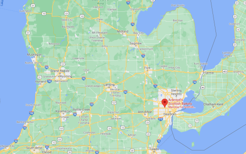 Map of Michigan highlighting Ackroyd's Scottish Bakery in Dearborn, near Detroit, with surrounding cities and highways.