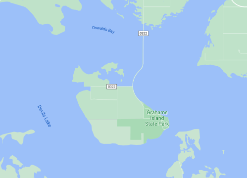 Map showing Grahams Island State Park and surrounding water bodies, including Oswalds Bay and Devils Lake.