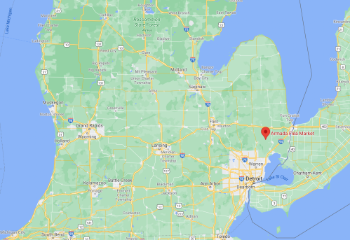 Map of Michigan highlighting the location of Armada Flea Market near Detroit.
