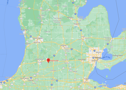 Map showing the state of Michigan with a red marker indicating the location of Stanton, near Grand Rapids and Detroit.