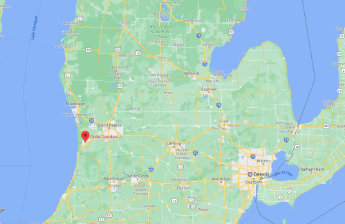 Map of Michigan highlighting the location of Gude Goodies near the western coast, northwest of Grand Rapids.