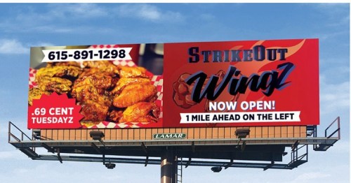 Billboard advertising StrikeOut Wingz with a phone number, featuring chicken wings and a "Now Open" announcement.