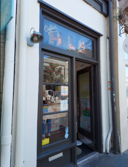 Exterior view of Callie's, a cozy shop with a welcoming entrance and a sign above the door.