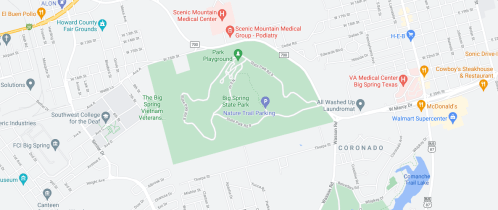 Map showing Big Spring State Park with trails, playground, and nearby amenities like restaurants and medical centers.