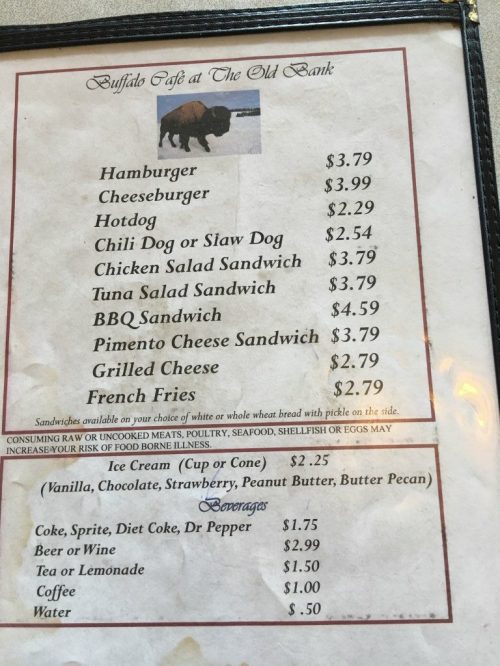 Menu featuring burgers, hotdogs, sandwiches, and sides with prices listed.