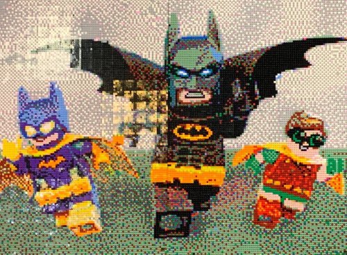 A colorful LEGO mosaic featuring Batman, Batgirl, and Robin in action poses.