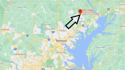 Map showing Baltimore area with a marker for "The Lodge," an American grub and brews venue in a rustic setting.