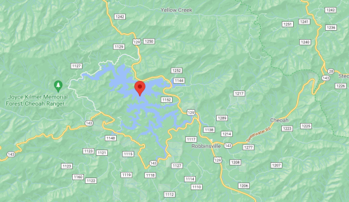 Map showing a lake surrounded by mountains, with nearby roads and landmarks like Joyce Kilmer Memorial Forest.