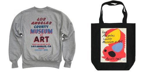 A gray sweatshirt and a black tote bag featuring the Los Angeles County Museum of Art logo and design elements.