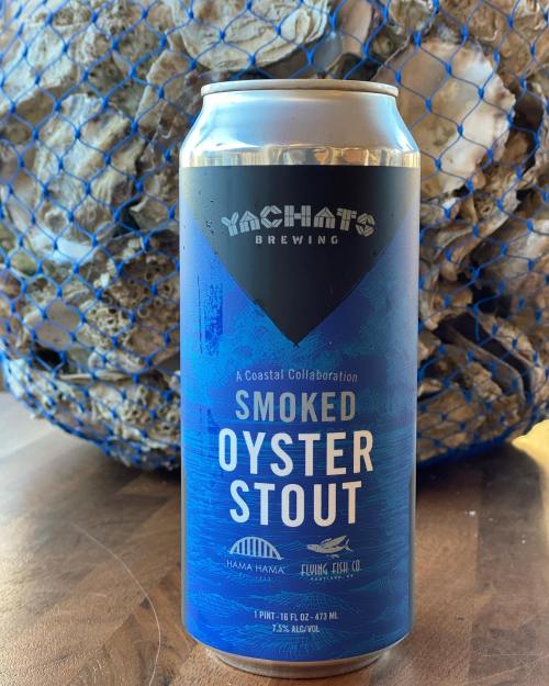 A can of Smoked Oyster Stout from Yachats Brewing, featuring a blue design and coastal collaboration branding.