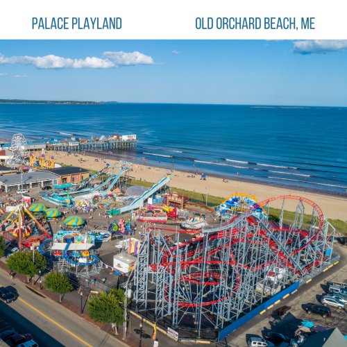 Aerial view of Palace Playland amusement park at Old Orchard Beach, featuring rides, beach, and ocean in the background.