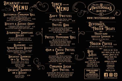 Menu from Twisted Doughs Bakery featuring breakfast and lunch items, beverages, and frozen treats.