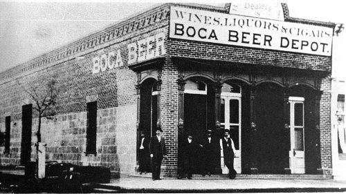 Historic black-and-white photo of the Boca Beer Depot building with people standing outside.