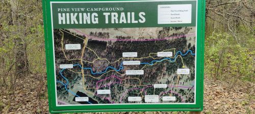 Map of Pine View Campground hiking trails, showing various routes and landmarks in a wooded area.