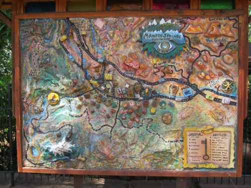 Colorful relief map of Manitou Springs, featuring trails, landmarks, and the Garden of the Gods. Key and legend included.
