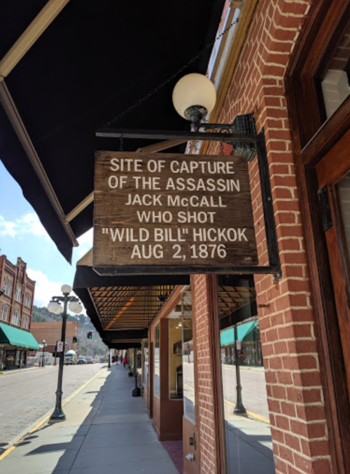 Sign marking the site of Jack McCall's capture for shooting Wild Bill Hickok on August 2, 1876.