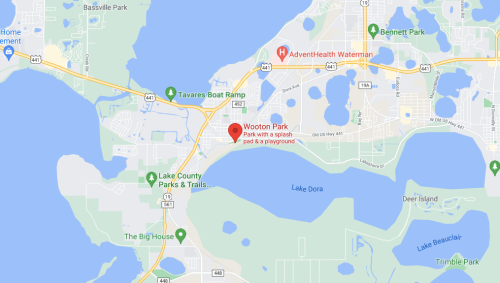 Map showing Wooton Park, featuring a splash pad and playground, near Lake Dora and various parks in Tavares, Florida.