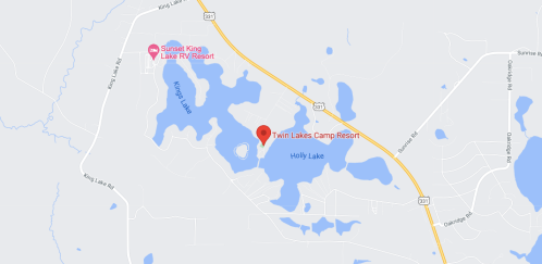 Map showing Twin Lakes Camp Resort near Holly Lake, with nearby roads and water bodies labeled.