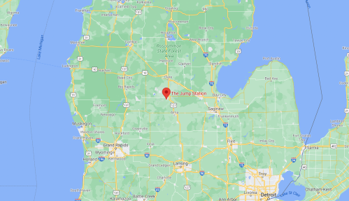 Map showing the location of The Jump Station in Michigan, near the cities of Saginaw and Grand Rapids.