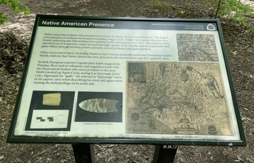 Sign about Native American artifacts and history, detailing discoveries and archaeological significance in Virginia.