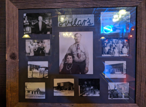 A framed collage of vintage black-and-white photos, featuring a couple and various historical scenes.