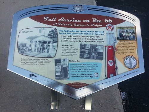 Sign about the Ambler-Becker Texaco Station on Route 66, detailing its history and service from 1933-1999.