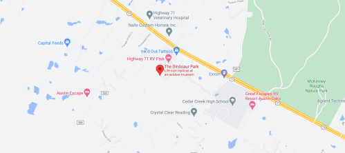 Map showing The Dinosaur Park near Highway 71, with nearby landmarks like Cedar Creek High School and various businesses.