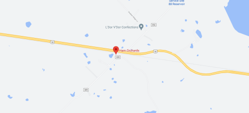 Map showing the location of Ham Oldhards along a highway, with nearby water bodies and roads marked.