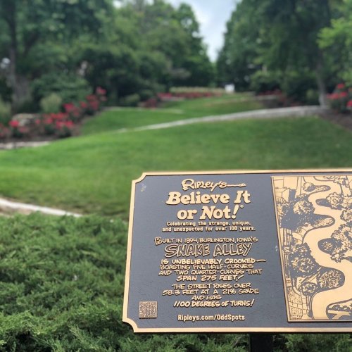 Sign for Ripley's Believe It or Not! featuring Snake Alley, highlighting its unique, crooked design in Burlington, Iowa.