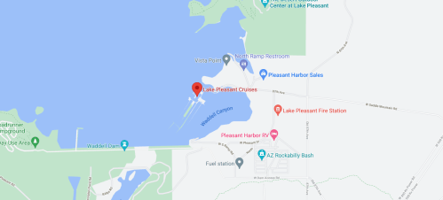Map showing Lake Pleasant with marked locations for cruises, restrooms, and nearby facilities.