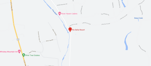 Map showing the location of Rio Bella Resort near the river, with nearby roads and landmarks indicated.