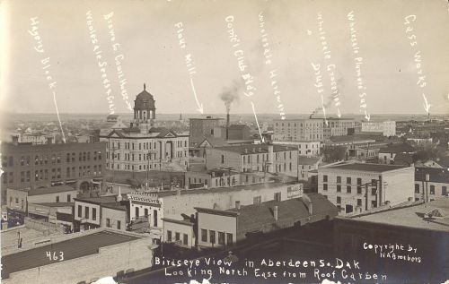 A historic black-and-white aerial view of Aberdeen, South Dakota, labeled with notable buildings and landmarks.