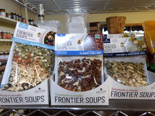 Three packages of Frontier Soups on a shelf: Wild Rice & Mushroom, Classic Chili Mix, and Chicken & Rice Soup Mix.