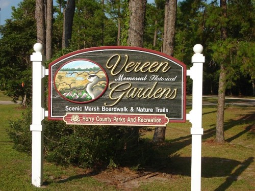 Sign for Vereen Memorial Historical Gardens, featuring scenic marsh boardwalk and nature trails. Horry County Parks and Recreation.