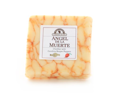 A block of cheddar cheese with a marbled appearance, labeled "Angel de la Muerte" with Carolina Reaper peppers.