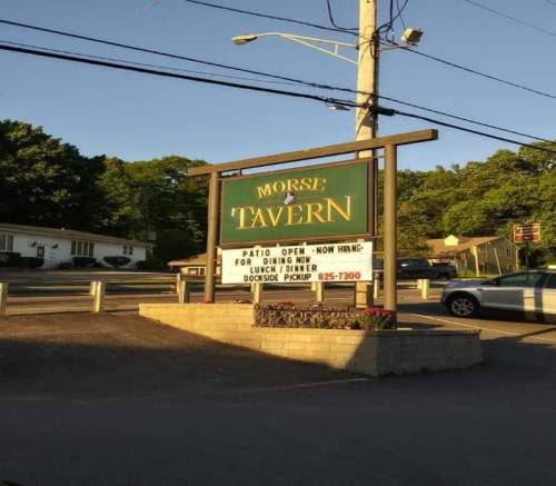 Sign for Morse Tavern, announcing patio open for dining and offering curbside pickup.
