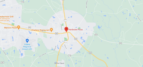Map showing a location marked as "Hardware Pizza" in a small town, with nearby roads and landmarks.