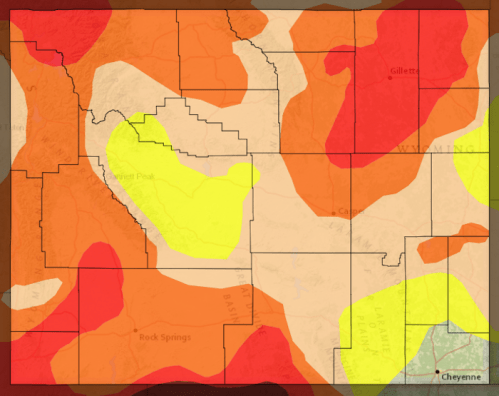 Map showing varying shades of red, orange, and yellow across regions, with labeled areas including Cheyenne and Rock Springs.